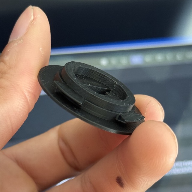 The twist lock plate I designed for the USB C charging port